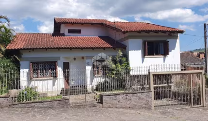 Casa com 4 quartos à venda na Rua Primeiro de Maio, 42, Partenon, Porto Alegre por R$ 1.330.000