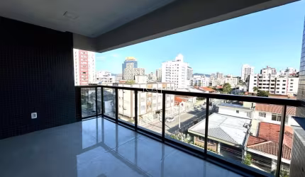 Apartamento com 3 suítes com lavabo e 2 vagas de garagem no Canto-Florianópolis