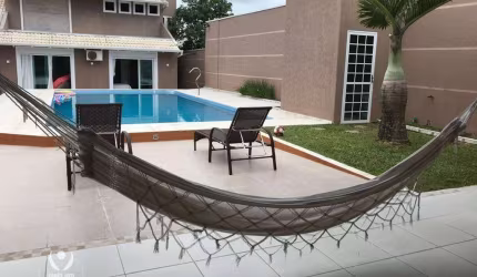 Casa 480m² com espaço gourmet e piscina, 7 quartos, 5 vagas de garagem à venda por R$ 2.500.000 - Piçarras - Guaratuba/PR