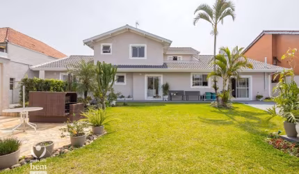 Aceita permuta 50% Casa de 365m², amplo terreno de 1.219,00m², 5 suítes, piscina aquecida à venda por R$ 3.600.000 - Jardim das Américas - Curitiba/PR