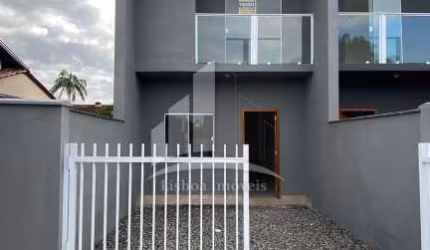 Sobrado geminado novo no Vila Nova.