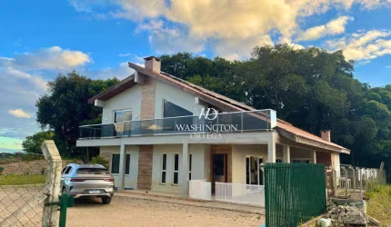 Casa de campo - 238m2. construídos em 21.650m2. de área - Campo Magro-Pr.