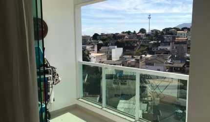 Apartamento à venda na Praia do Morro, Guarapari, ES. Sendo quarto amplo, sala, cozinha, área de serviço, varanda e 1 vaga de garagem.