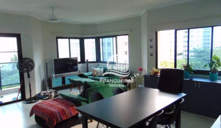 Flat com 3 dormitórios à venda, 112 m² por R$ 750.000,00 - Pitangueiras - Guarujá/SP