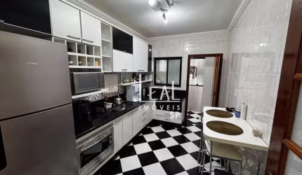 Apartamento com 2 dormitórios à venda, 107 m² por R$ 590.000,00 - Canto do Forte - Praia Grande/SP