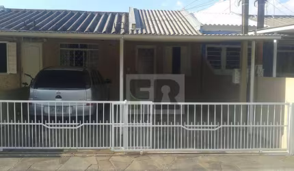 Casa 2 dormitórios com vaga de garagem em condomínio fechado á venda no bairro Bela Vista em Alvorada RS.
