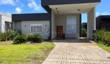 Casa em condomínio fechado com 4 quartos à venda na Avenida Diamante, 1173, Rainha do Mar, Xangri-Lá por R$ 1.800.000