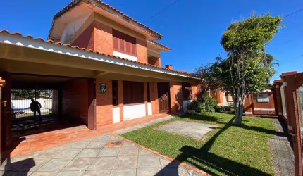 Casa em condomínio fechado com 5 quartos à venda na Rio da Várzea, 2288, Centro, Xangri-Lá por R$ 895.000