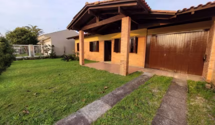 Casa em condomínio fechado com 3 quartos à venda na Rua Miraguaia, 496, Atlântida, Xangri-Lá por R$ 636.000