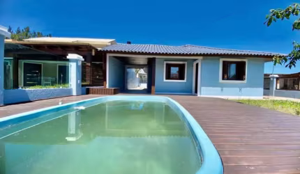 Casa em condomínio fechado com 3 quartos à venda na Heitor Villa Lobos, 134, Arpoador, Xangri-Lá por R$ 600.000