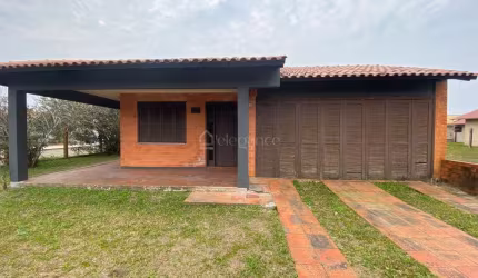 Casa em condomínio fechado com 3 quartos à venda na Rua Cel. Virgílio Carneiro Borges, 274, Remanso, Xangri-Lá por R$ 695.000
