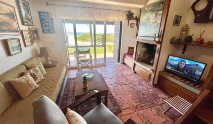 Casa em condomínio fechado com 2 quartos à venda na Beira Mar, 9, Centro, Xangri-Lá por R$ 580.000
