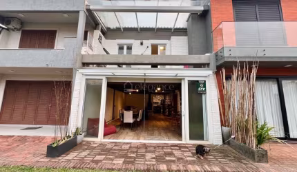Casa em condomínio fechado com 3 quartos à venda na Rua Irerê, 561, Atlântida, Xangri-Lá por R$ 620.000