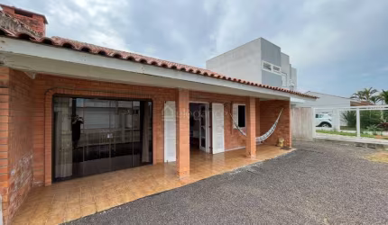 Casa em condomínio fechado com 3 quartos à venda na Rua Rio Comandaí, 2013, Centro, Xangri-Lá por R$ 600.000