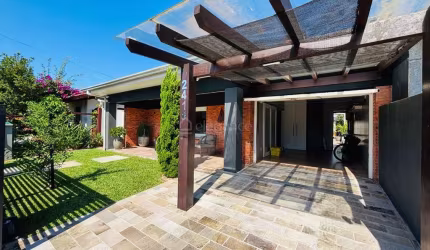 Casa em condomínio fechado com 3 quartos à venda na Rio Da Várzea, 2418, Centro, Xangri-Lá por R$ 1.450.000