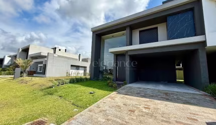 Casa em condomínio fechado com 4 quartos à venda na Rua Rio Camisas, 12, Centro, Xangri-Lá por R$ 1.950.000