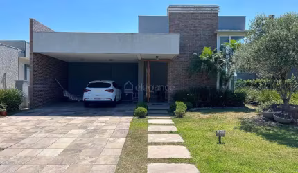 Casa em condomínio fechado com 4 quartos à venda na Honório Germano, 2009, Araça, Capão da Canoa por R$ 1.250.000