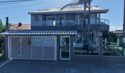 Casa com 5 quartos à venda na Rua Cassiterita, 327, Rainha do Mar, Xangri-Lá por R$ 1.200.000