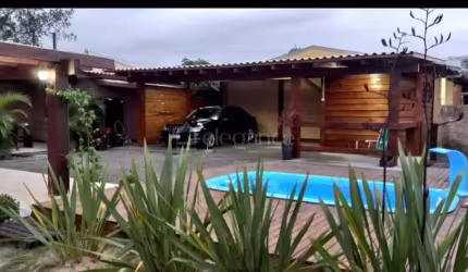 Casa com 3 quartos à venda na Dos Lírios, 502, Noiva Do Mar, Xangri-Lá por R$ 950.000