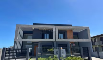Casa em condomínio fechado com 4 quartos à venda na Coral, 185, Rainha do Mar, Xangri-Lá por R$ 1.450.000
