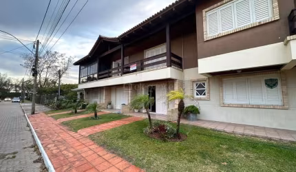 Casa em condomínio fechado com 2 quartos à venda na Marfim, 91, Rainha do Mar, Xangri-Lá por R$ 350.000