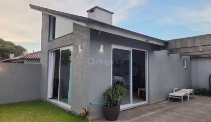 Casa em condomínio fechado com 3 quartos à venda na Topázio, 483, Rainha do Mar, Xangri-Lá por R$ 830.000