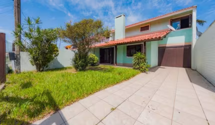 Sobrado à Venda no Centro de Imbé – 4 dormitórios, 3 banheiros e piscina!