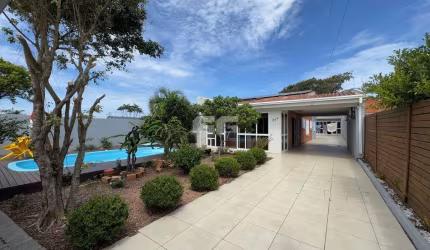 CASA DE 5 DORMITÓRIOS COM PISCINA EM IMBÉ