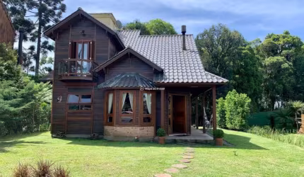 Casa em condomínio fechado com 3 quartos à venda na Rua Vitório Carassai, 277, Parque das Hortênsias, Canela por R$ 1.700.000