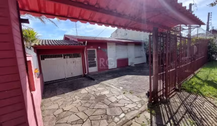 Excelente residência de 3 dormitórios&lt;BR&gt;no Condominio Jardim Medianeira&lt;BR&gt;terreno plano, todo  murado e com cerca aramada em cima da grade e do muro&lt;BR&gt;casa térrea, com hall de ent