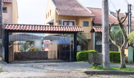 Ótima residência com 3 dormitórios sendo 01 suíte com hidro e sacada, living 02 ambientes com lavabo, ampla cozinha americana, sótão amplo para 02 ambientes, salão de festas com churrasqueira e banhei
