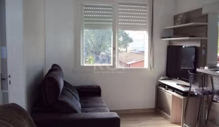 Apartamento de frente  com 1 dormitório, banheiro mobiliado, cozinha  sob medida 100% MDF, Cuba  da pia com granito  divisória  da da área  de serviço  em vidro,  na sala bancada de granito com lâmpad