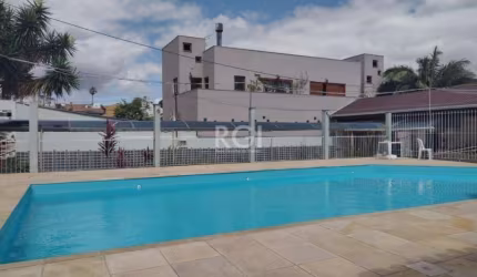 Apartamento com 2 dormitórios, living que integra a sala de estar à sala a de jantar, cozinha americana, área de serviço/lavanderia e banheiro social, além de uma vaga de estacionamento.&lt;BR&gt;&lt;