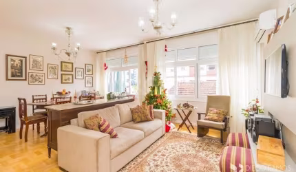 Vende-se apartamento de 3 dormitórios sendo 1 suíte, reformado por arquiteto, ensolarado, vista perene, banheiro social, living amplo em 2 ambientes, copa e cozinha com móveis modernos, área de serviç