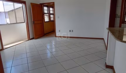 Excelente apartamento, totalmente reformado, 2 dormitórios, amplo living, cozinha americana mobiliada, área de serviço separada. Silencioso e muito iluminado e arejado. Vista livre. Dois  lances de es