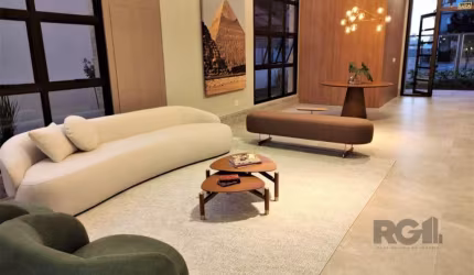 Lindo apartamento 2 dormitórios com living 2 ambientes, andar alto com vista, 2 suítes, lavabo, cozinha americana com churrasqueira, área de serviço e excelente posição solar. Condomínio com amplo hal