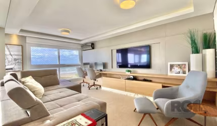 Este luxuoso apartamento de 4 dormitórios, sendo 2 suítes, oferece um ambiente sofisticado e confortável à beira-mar. Com um banheiro social e lavabo, o espaço foi projetado para atender todas as suas