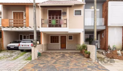 Excelente sobrado semi mobiliado próximo ao Zaffari da Hípica 3 dormitórios sendo um suíte com closet e sacada, living 2 ambientes, lavabo, cozinha com moveis planejados, área de serviço, pátio, garag