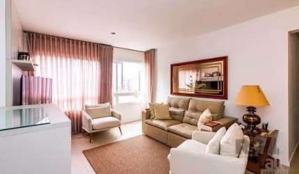 Ótimo apartamento no Condomínio Villaggio Menino Deus, de frente, andar alto, com 76m² privativos, de 3 dormitórios e 2 vagas. Possui living amplo para 2 ambientes, 3 dormitórios sendo 1 suíte, banhei