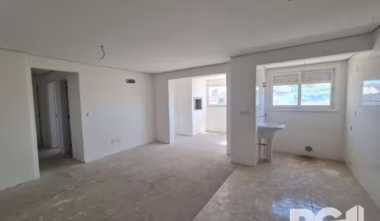 Excelente apartamento com 2 quartos e 1 suíte, amplo living com 2 ambientes e sacada integrada com linda vista e ensolarada. Cozinha americana, lareira e churrasqueira. Espera para ar condicionado.&lt