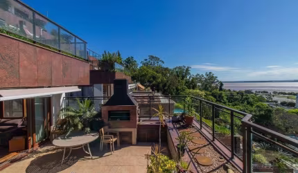 Apartamento com vista maravilhosa do por do sol ao Rio Guaíba, conta com (287m²) de área privatival, 3 dormitórios, sendo 1 suíte, piscina, churrasqueira e 2 vagascobertas. Com uma vista espetacular d