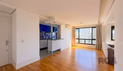 Apartamento de 3 dormitórios, sendo uma suíte, semi-mobiliado com churrasqueira e terceiro dormitório aberto para living estendido. Imóvel em andar alto, com&lt;BR&gt;02 vagas de garagem simples, cobe