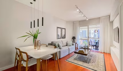 Apartamento no bairro Auxiliadora em Porto Alegre. Living com 2 ambientes,  ampla sacada com churrasqueira, cozinha e lavanderia separada. Lavabo. Parte íntima composta por duas suítes, sendo uma com 