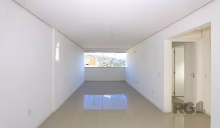 Apartamento de 71m² para comprar, novo e nunca Habitado, 2 dormitórios (1 suíte), com excelente vista para a cidade, living para 2 ambientes com churrasqueira e piso em porcelanato 60x60 instalado, re