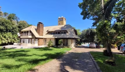 Casa maravilhosa em terreno de 8.125m² com acesso ao Rio Guaiba,  na Estrada Retiro da Ponta Grossa - Porto Alegre&lt;BR&gt;&lt;BR&gt;Casa em Porto Alegre, Zona Sul, com 4 suites,  parte de baixo com 