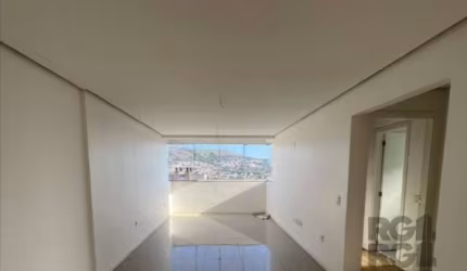 Apartamento 79,85 privativos, frente, 2 dormitórios (1 suíte), living para 2 ambientes, churrasqueira, banheiro social com ventilação natural, cozinha americana e área de serviços. 2 vaga de garagem s