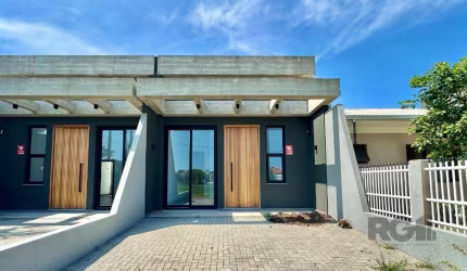 Casa à venda em Capão da Canoa, com 71,56 m² de área construída, ideal para quem busca conforto e praticidade. O imóvel possui 02 dormitórios, sendo ambos suítes, oferecendo mais privacidade e comodid