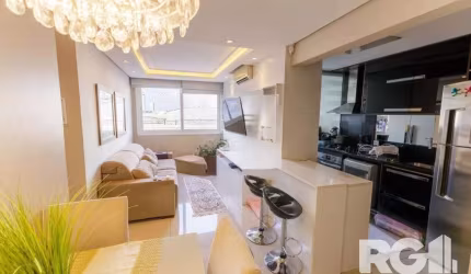 Este aconchegante apartamento mobiliado e decorado está disponível para venda no bairro São João, em Porto Alegre. Com dois dormitórios, sendo uma suíte, e dois banheiros, ele oferece conforto e prati