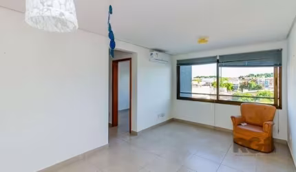 Apartamento semi-mobiliado, com 61,79m², 2 dormitórios, sendo 1 suíte, amplo living unindo sala de estar e jantar, churrasqueira, vaga coberta e escriturada. Localização privilegiada, à poucos metros 