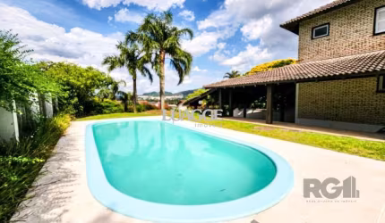 Casa de Condomínio em Cavalhada